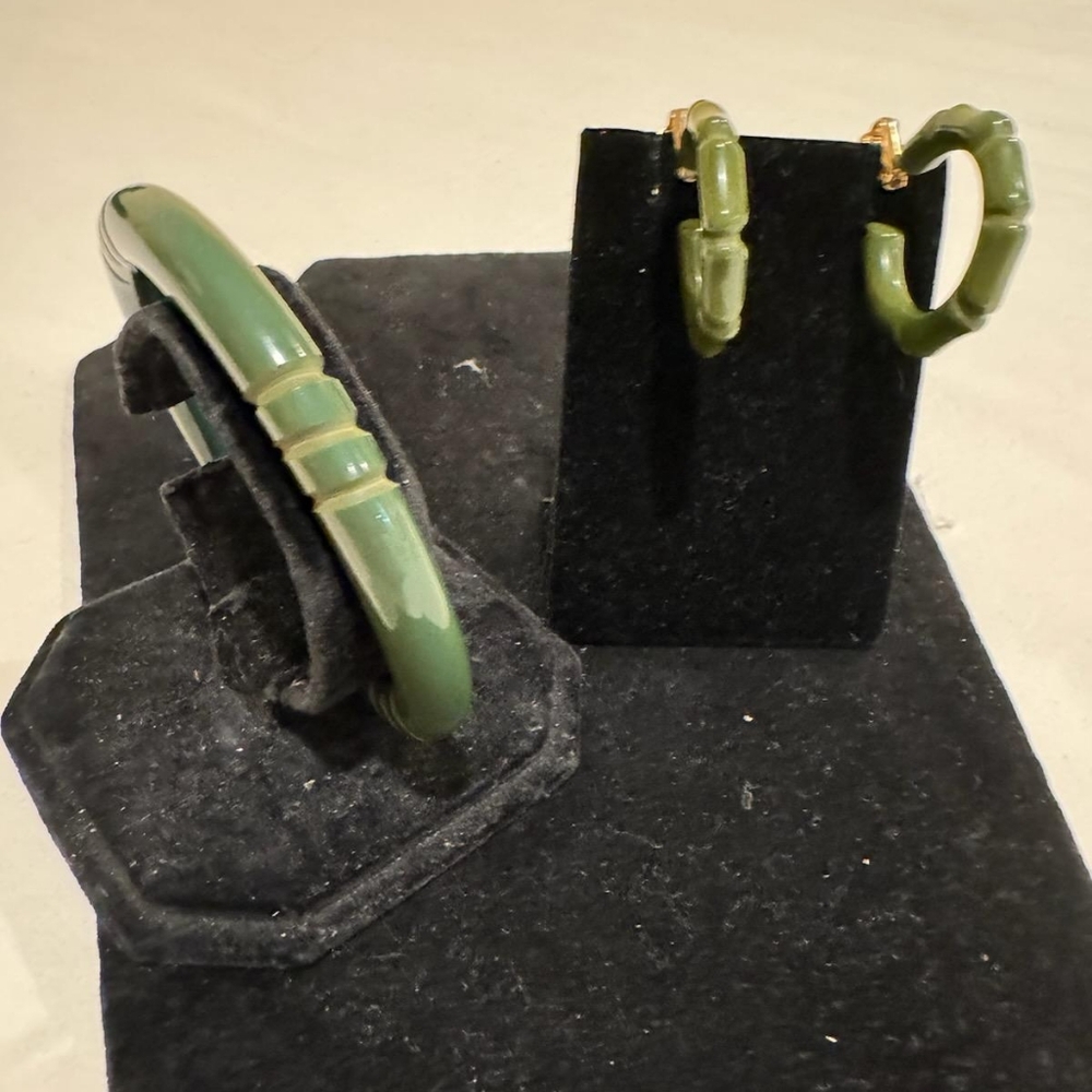 Bakelite Green carved bracelet and clip earrings